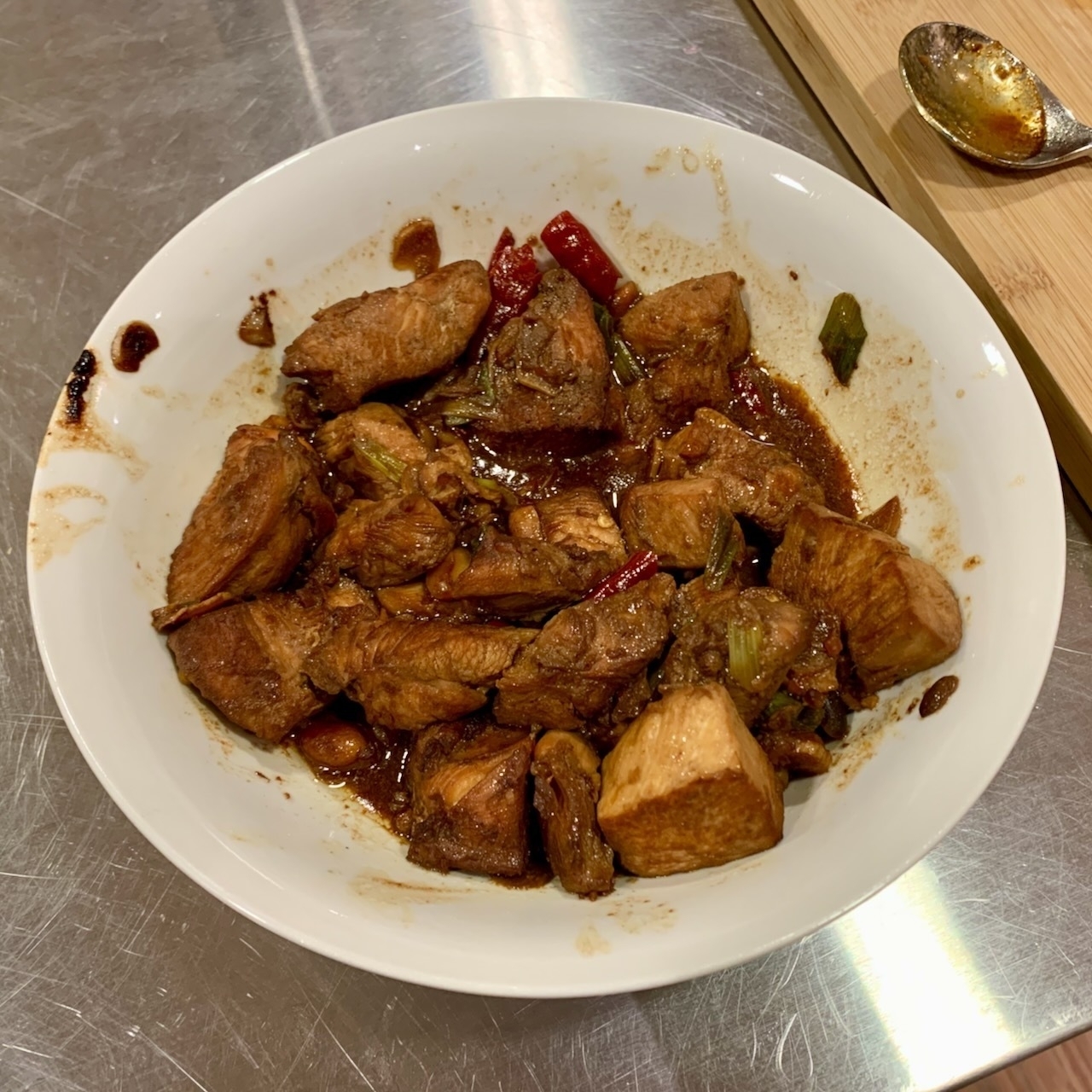 Kung Po Chicken in a white porcelain bowl